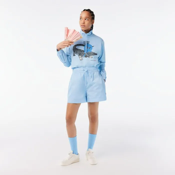 Sweaters and Sweatshirts Women Lacoste Womens Lacoste X Netflix Loose Fit Organic Cotton Fleece Sweatshirt Pastel Blue Hbp