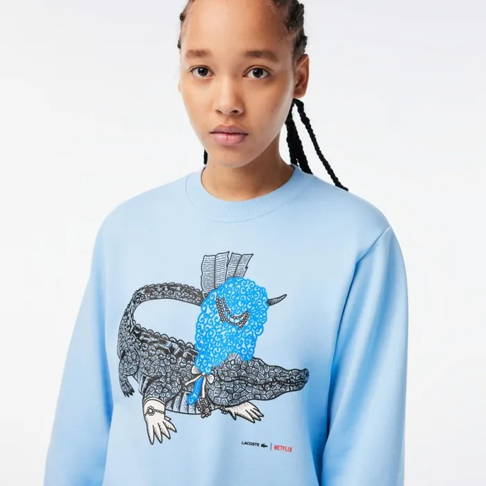 Sweaters and Sweatshirts Women Lacoste Womens Lacoste X Netflix Loose Fit Organic Cotton Fleece Sweatshirt Pastel Blue Hbp