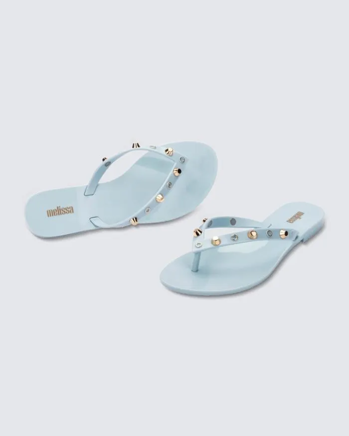 Women Harmonic Studs Blue Melissa Flip Flops